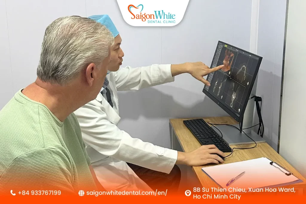 Doctor explaining to patient through 3D Cone Beam CT (CBCT) scan